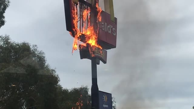 Fast Food Sign on Fire