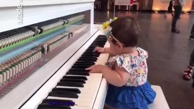 Baby playing piano