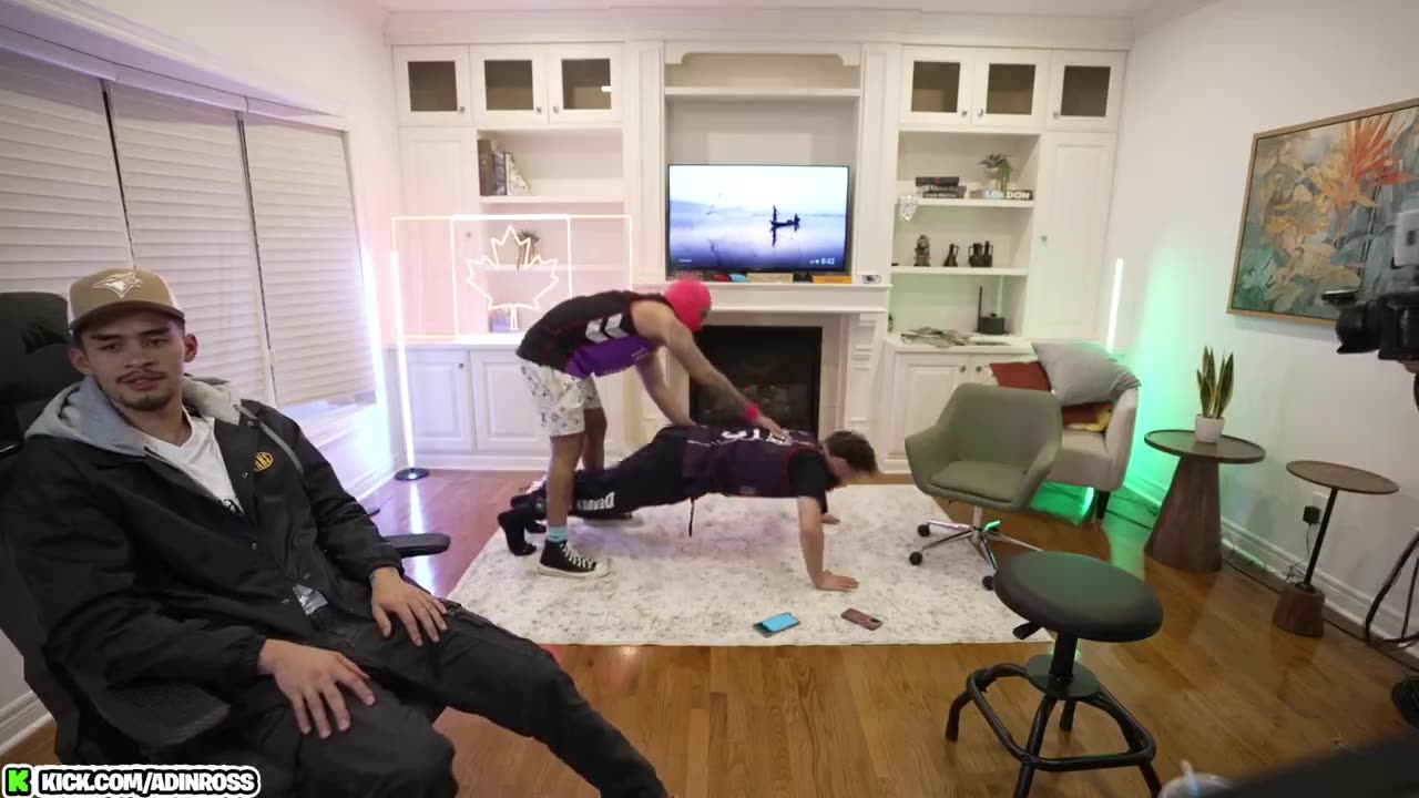 Sneako sitting in a chair just watching Adin Ross and Fousey get freak