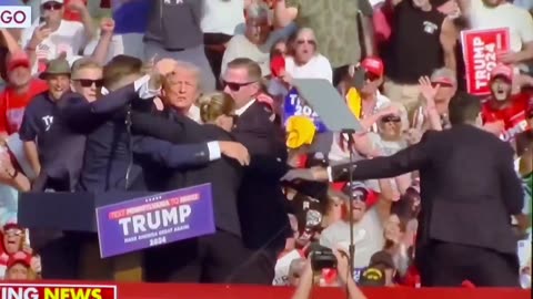 Secret Service preparing to move President Trump off stage.