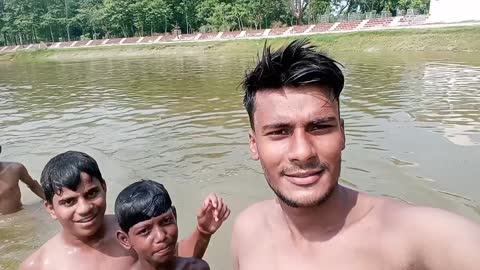 Bathing in my village pond (pokhari)