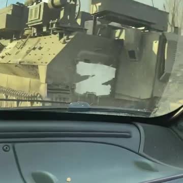 Woman throwing Molotov cocktails at Russian tanks sets herself on fire