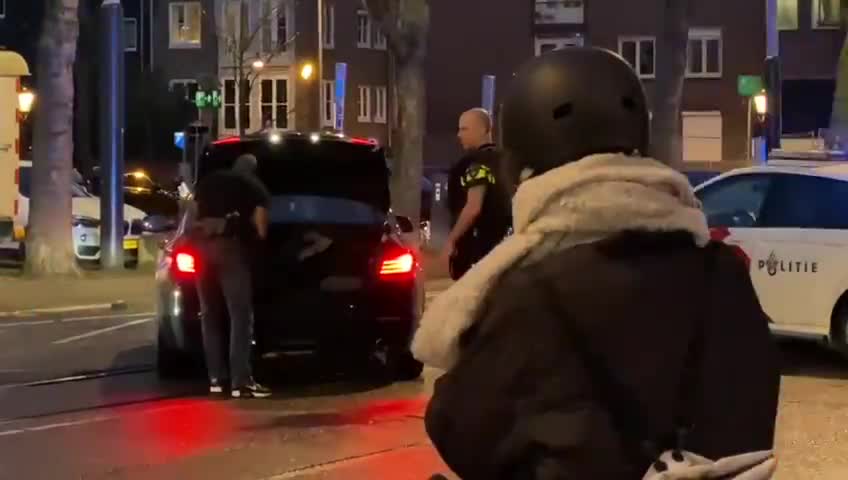 Dozens of armed response officers at "The Hostage Situation in Amsterdam"