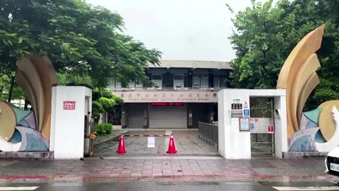 Deadly typhoon sinks freighter as it barrels through Taiwan