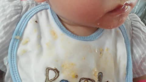 Cute Toddler eating while sleepy