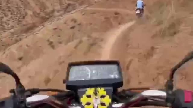 motorcycle over mountains