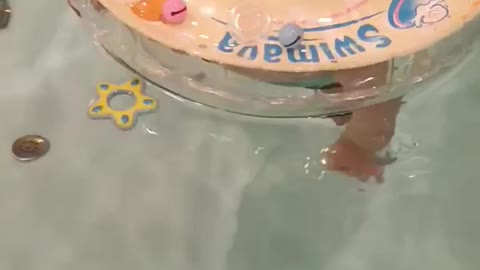 a swimming baby