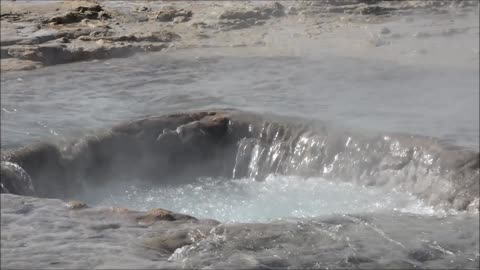 Round Geyser Throw Water Out Of Strokkur Iceland