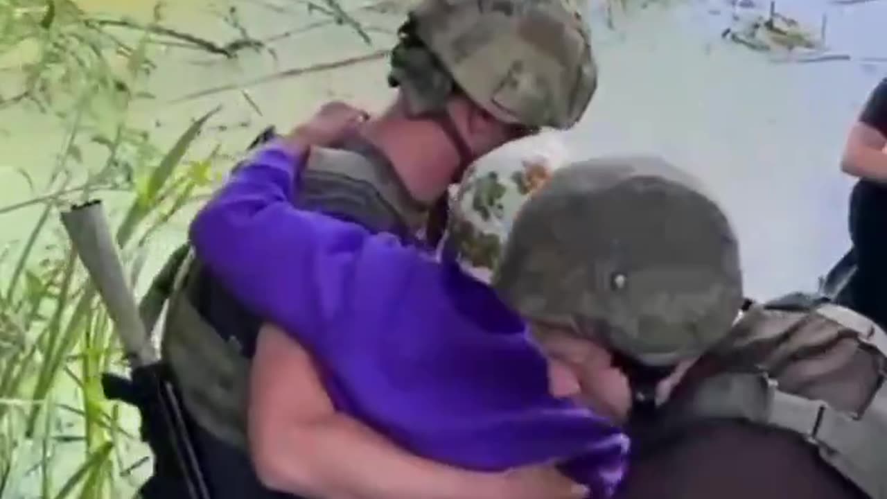 The evacuation of local residents by boats across the Seym River in Kursk region