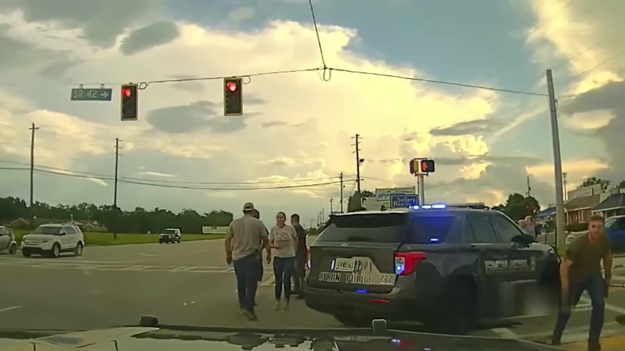 Woman With Child in Car Rams Multiple People & Police Cars While Trying to Avoid Arrest