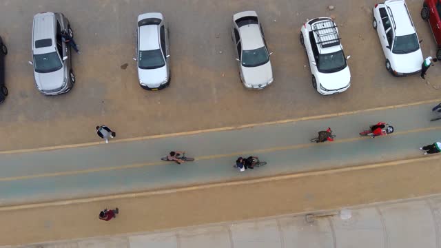 Footage Drone recording people near the beach.