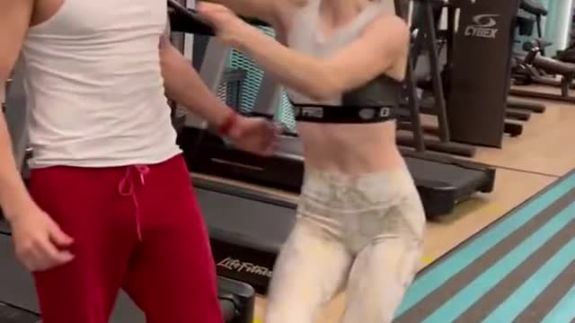 Workout gym training with cute girl