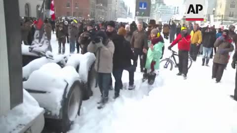 Canada police engage in tense standoff with protesters