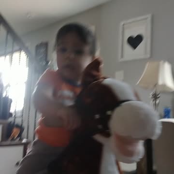 Riding his rocking horse