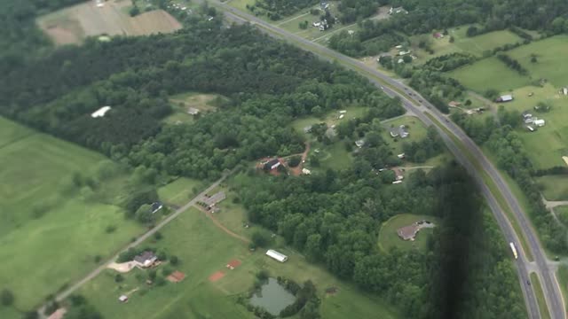 Professional Wing Walker Enjoys View from Biplane