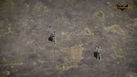 Astonishing Footage: Ukrainian Drone Encircles 2 Russian Troops - One Takes Risky Move
