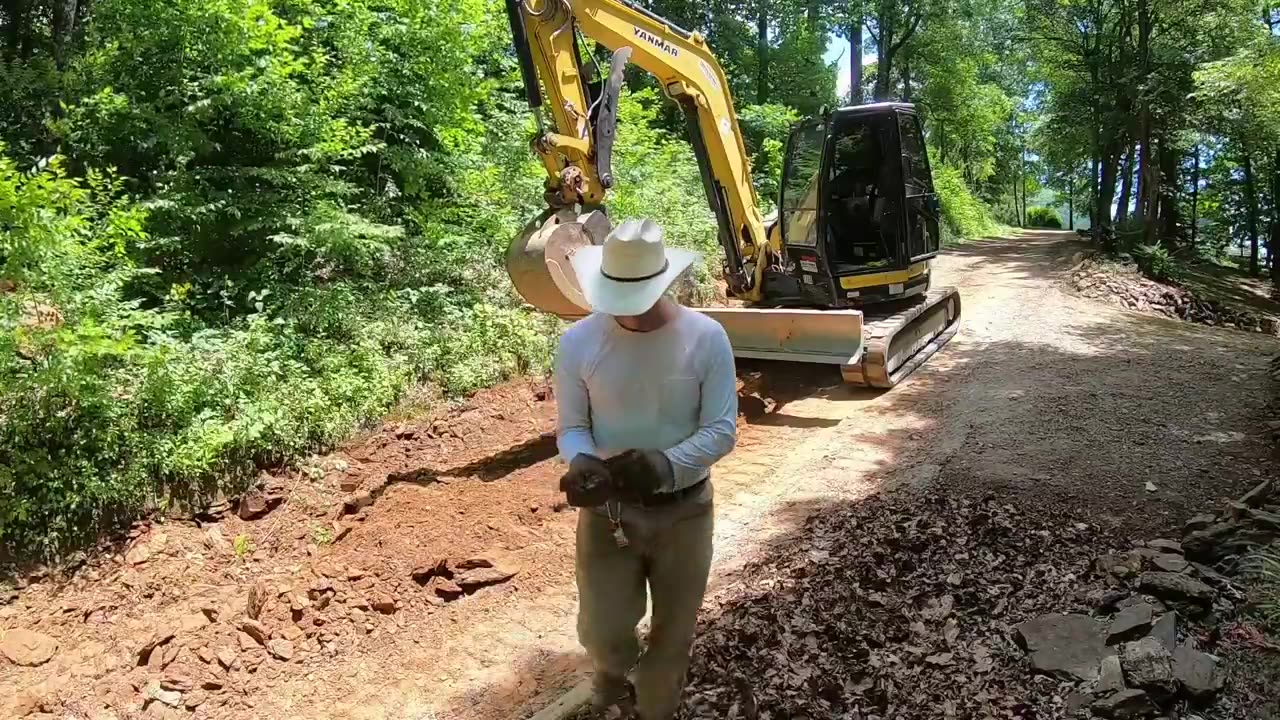 Gravel Road Repairs With Yanmar Vio80 Excavator-hitting rock