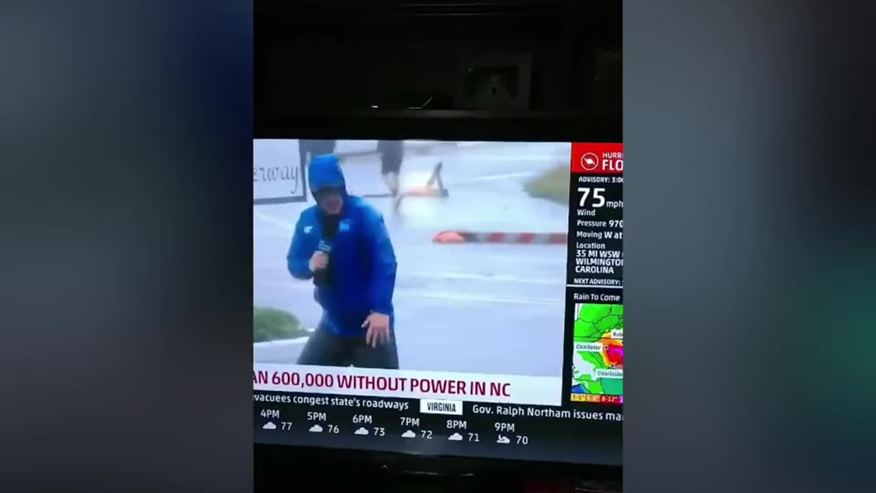 MSM journalist pretends to struggle against the wind