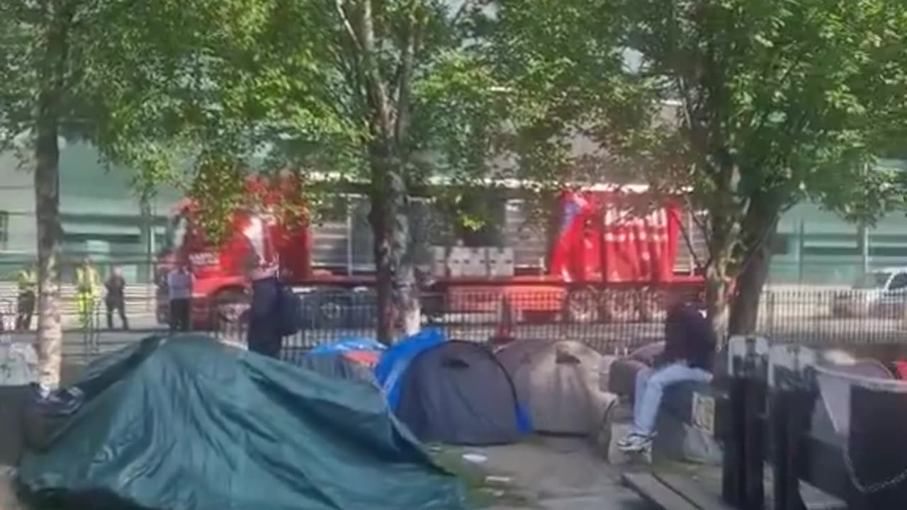 Grand canal Dublin Tents being removed and the illegals moved into working