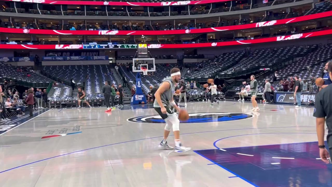 Klay Thompson begins his pregame workout with some mid-range jumpers