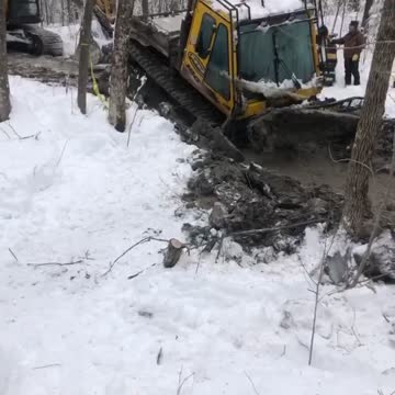 Groomer stuck deep on the trail