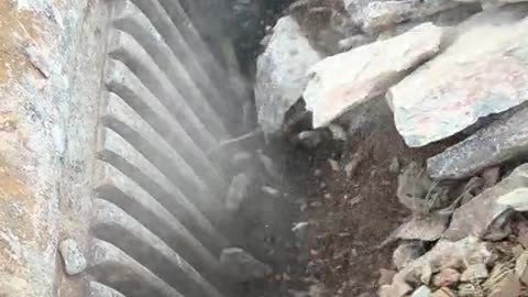 The rock crushing part 12