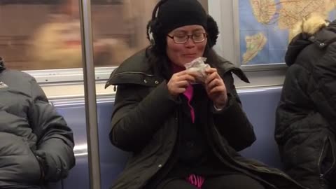 Woman eats out of plastic bag but cant reach the food