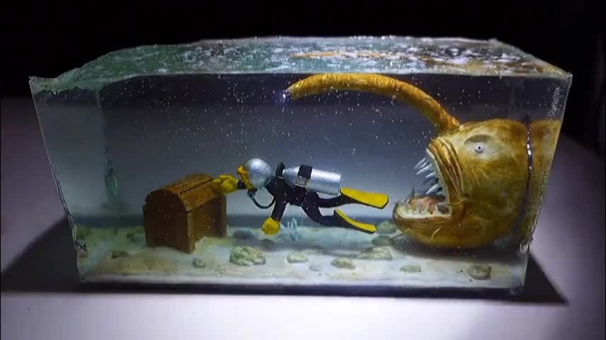 Handmade 'Lantern Fish Chasing Divers' miniature scene stereoscopic model