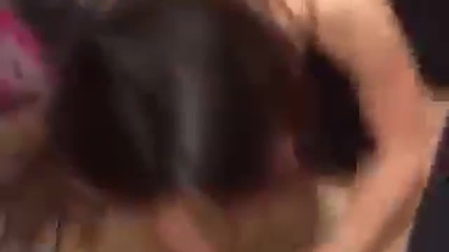 Embarrassed girl in blue dress falls trying to run away from camera