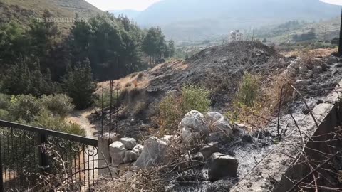 Survivor reacts to strikes as Syria blames Israel after 18 killed