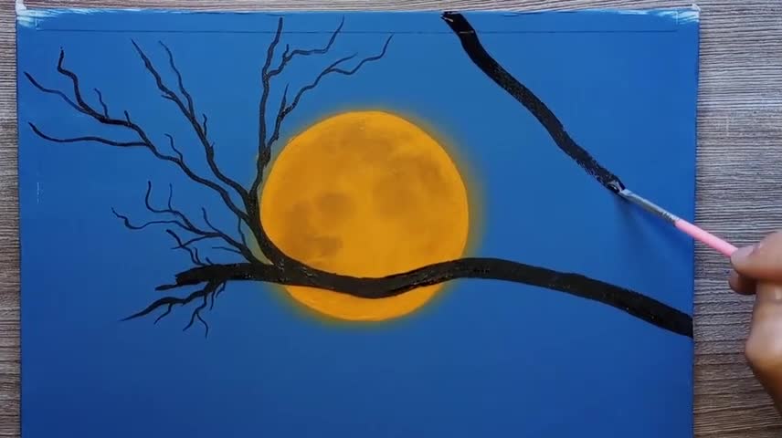 The Moon Hides Behind The Branches