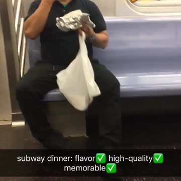 Man eating tacos on subway diner black polo shirt