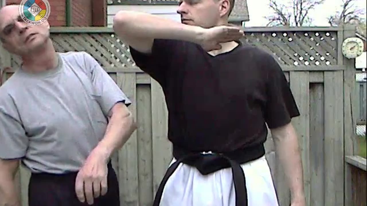 Baehr Taekwondo: white-belt-one-hand-holding-02-closeup