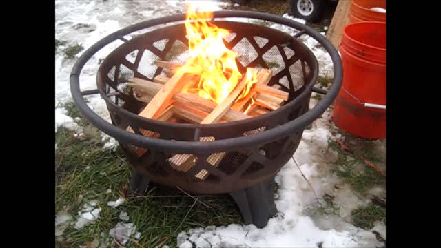 First solo fire for her. Backyard fire building skills practice.