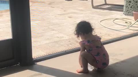 Playing alone in the shade