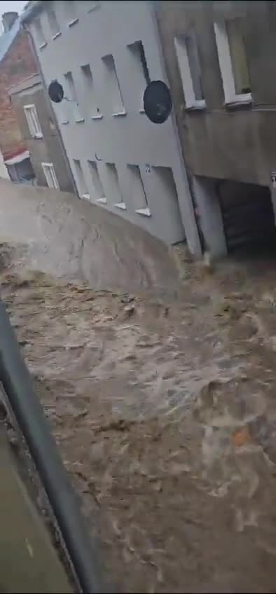 Massive Flooding happening in Poland where the streets are literally RIVERS!