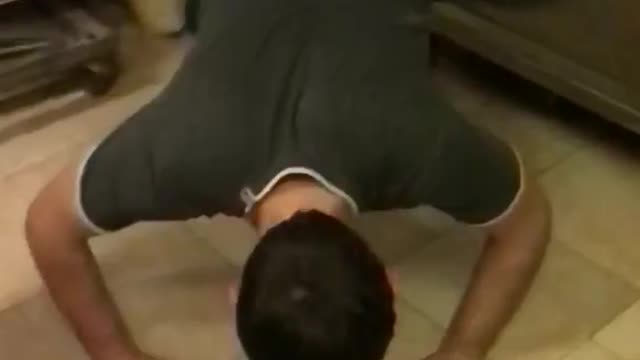 Slomo green shirt attempts clapping pushups faceplants