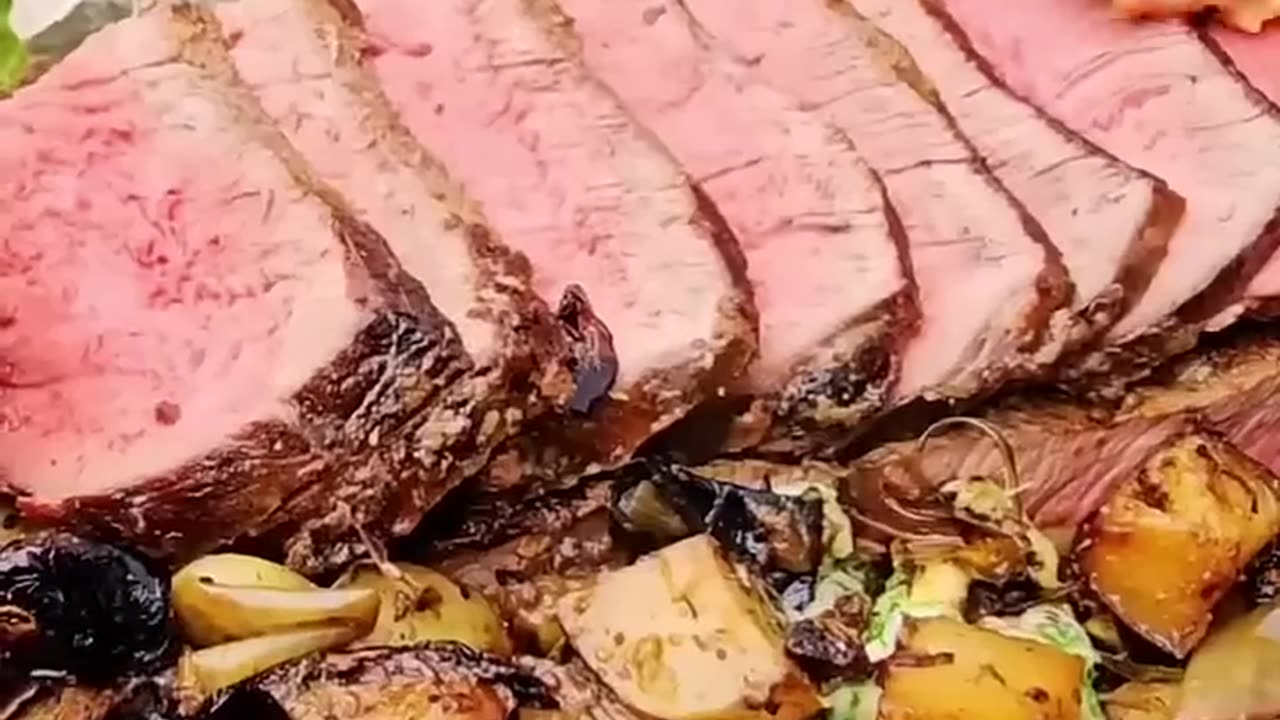 giant tom and jerry steak fried on a stone out door cooking