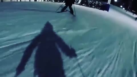 Two skiers bush jump