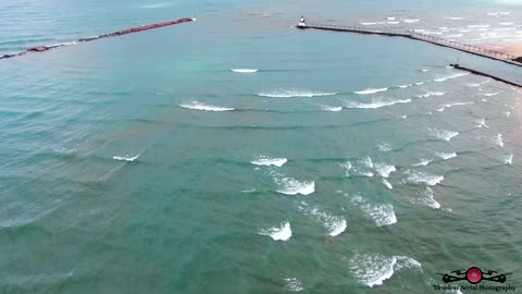 Square Waves Forming Around Michigan City, IN Lighthouse 4K Drone Footage