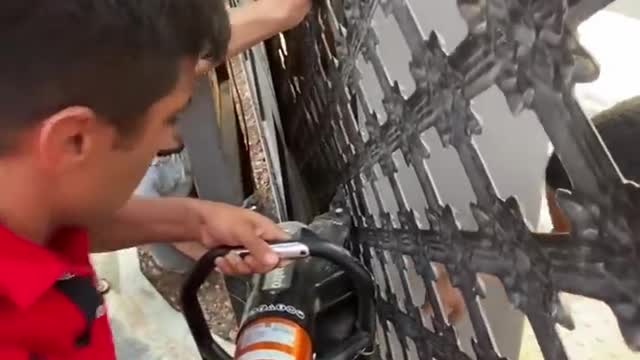 Rescue Team Manages to Free a Child Trapped Between an Electronic Door and a Wall