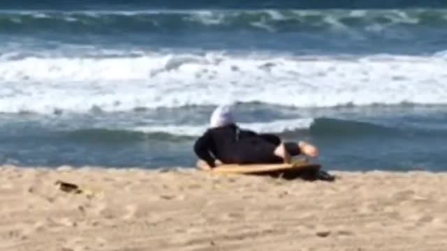 Nailed it beanie guy stands up on orange board