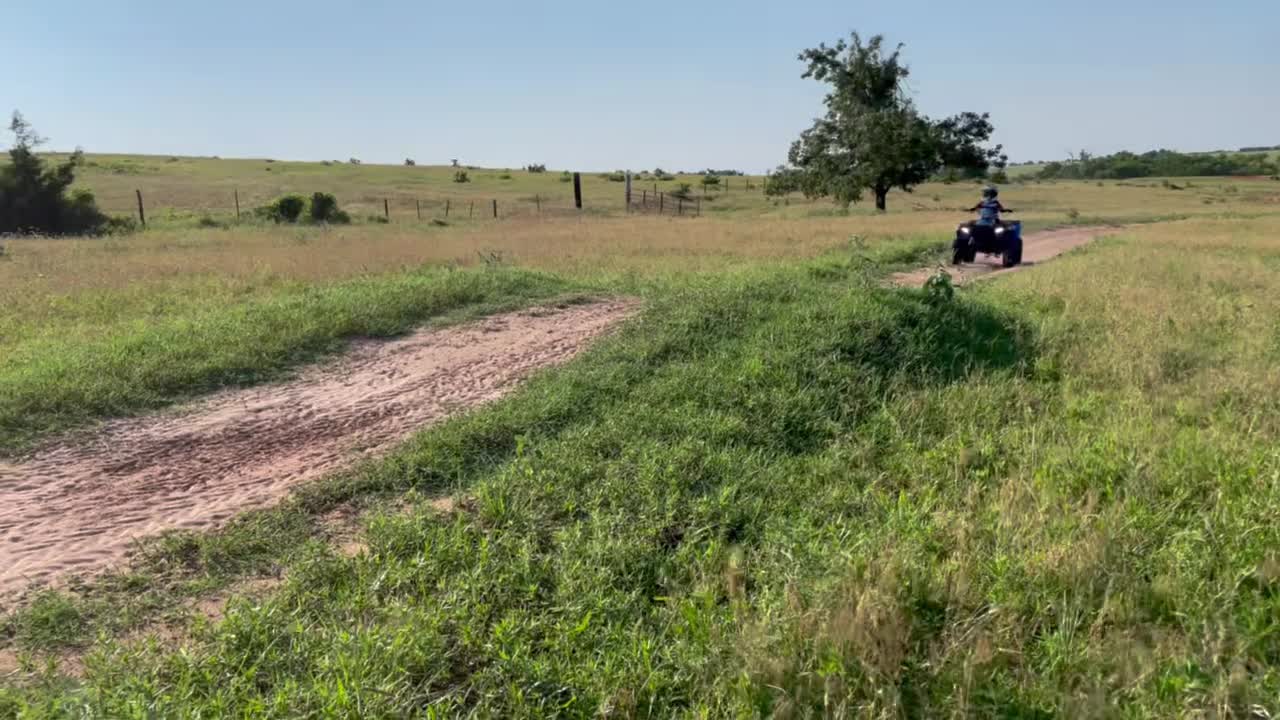 my little bro riding a quad!