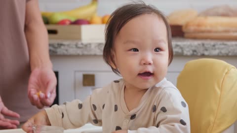 Cute Asian Kid Smiling with Joy