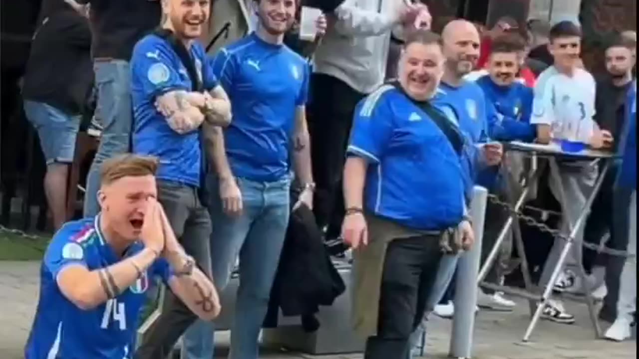 Albania fans snap spaghetti in front of their Italian fans