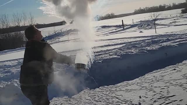 Hot water turns into snow