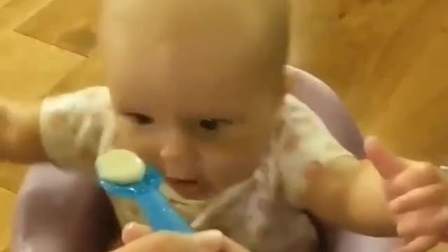 check out this cute baby reaction with a toy