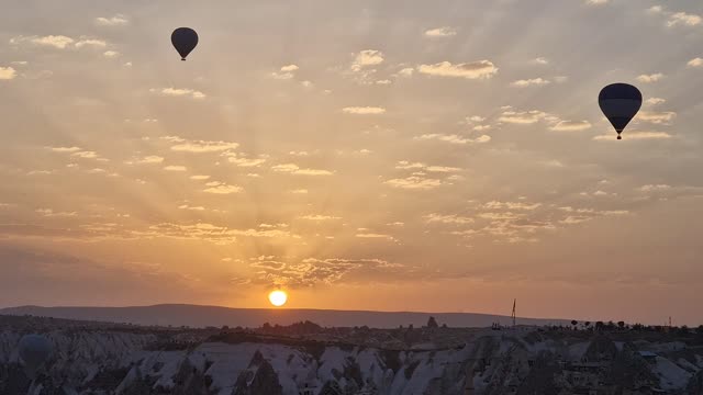 Stunning Golden Sunrise with air balloons