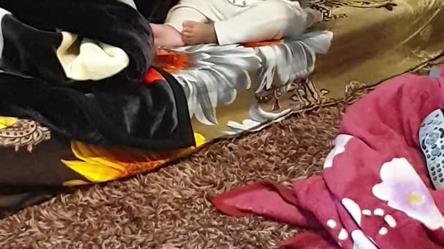 Cute baby dancing on his favorite cartoons