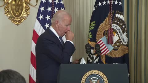 Biden takes off his mask and immediately starts coughing into his hand